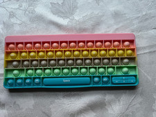 rainbow silicone keyboard with letters and nunbers pop bubble picture