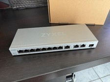 ZyXEL XGS1250-12 12 Port 10Gbps  Standalone Ethernet Switch picture