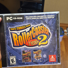 Atari RollerCoaster Tycoon 2 Triple Thrill Pack PC CD-ROM Game Windows 7/10 picture