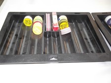 Dealer chip trays black in color with gaming supplys.   buy one get one for free picture