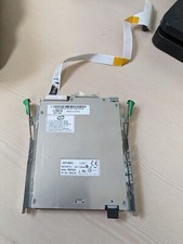 Various slim 1.44 3.25 floppy drives with ribbon cables and bracket No faceplate picture