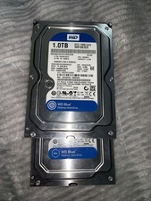 2  Used Western Digital (WD) Blue 1.0TB Desktop Hard Drive, model WD10EZEX. picture