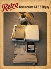 Commodore 1541 floppy disk drive with original box, styrofoam, manual powers on picture