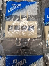 Lot of 14 -  Leviton (10) 49910-HW4, 4-Port,Ivory, (4) - 49910-SI2 Blank Inserts picture