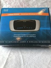 Linksys E2000 300 Mbps 4-Port Gigabit Wireless N Router (B003B20F54) in box picture