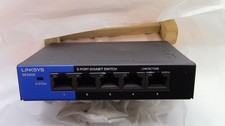 Linksys SE3005 V2 5-Port Gigabit Ethernet Switch and power adapter - tested fine picture