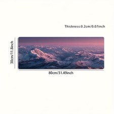 A Large Gaming Mouse Pad Featuring a Pink And Purple Snow-Capped Mountain Land picture