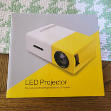 Mini Portable Projector. compact travel projector. picture