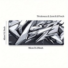 A Large Gaming Mouse Pad Featuring a Black And White Geometric Graffiti Street picture