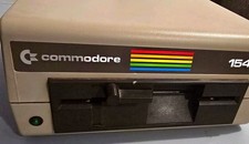Commodore 1541 Floppy Drive Powers On Lights Untested Parts Repair picture