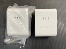 NEW Netgear XEB1004 85 Mbps Wall-Plugged Ethernet Switch picture