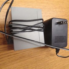 Allied Telesyn 5-port AT-FS705LE Ethernet Switch with power supply picture