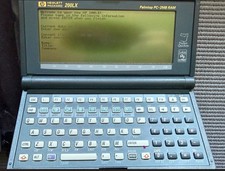 Vintage HP 200LX Palmtop PC-2MB Ram - Works but with screen issues picture