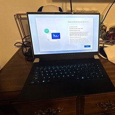 Dell Alienware x14 r1 white with original charger and a warranty picture