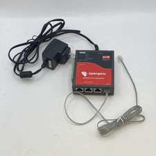 Opengear ACM5003-M-F-E Advanced Console Manager w/ Power Supply & Modem Cable picture